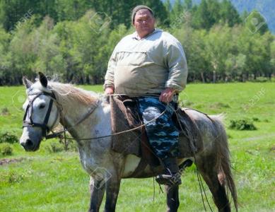 11291154-Thick-dirty-man-on-horseback-What-looks-like-the-Sancho-Panza-Stock-Photo.jpg